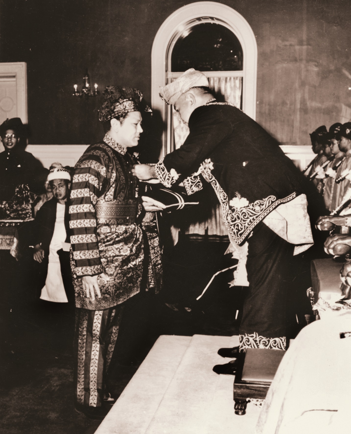 P. Ramlee receiving royal investiture